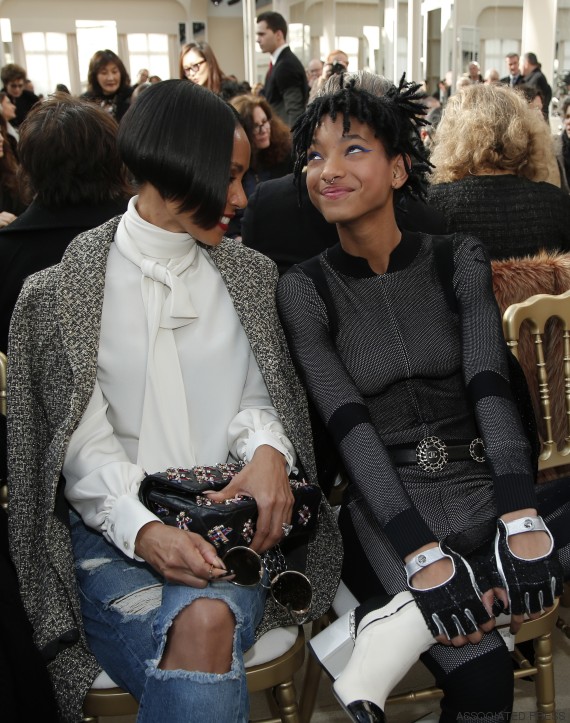 Willow Smith, right, and her mother Jada Pinkett Smith wait before Chanel's Fall-Winter 2016-2017 ready to wear fashion collection presented in Paris, Tuesday, March 8, 2016. (AP Photo/Thibault Camus)